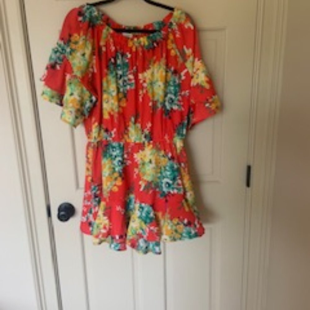 Bright orange with flowers romper